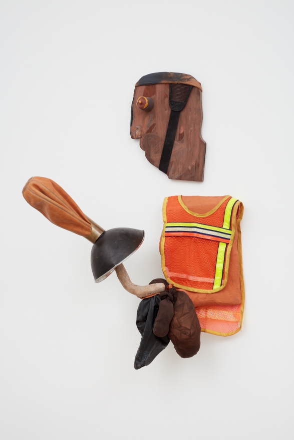 Blair Saxon-Hill In The Ring, 2018 Speed bag, metal lamp head, brass coffee scoop, driftwood, tan leather and brown panty hose, hydrocal, hi-vis vest, fiber reinforced plaster, gouache, wood, ceramic, nails, strap, acrylic spray paint on leather 43 x 36 x 17 1/2 in 109.2 x 91.4 x 44.5 cm (BSH18.048)