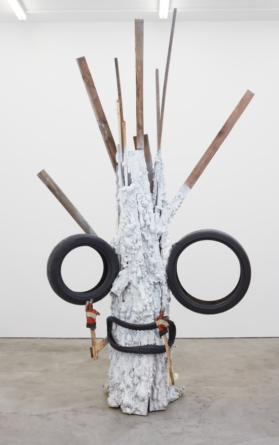 Jon Pylypchuk Business in the front, party in the back, despair in the middle, 2018 Spray Foam, Wood, Tires and Gloves 133 x 78 x 44 in 337.8 x 198.1 x 111.8 cm (JPY18.016)